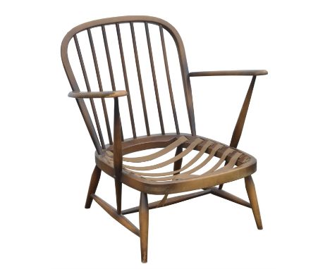Ercol, a spindle back armchair, with loose cushions, lacking stuffing, 77cm highCondition Report:  Webbing straps need replac