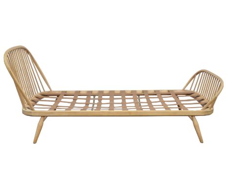 Ercol, a beech wood day bed frame, with spindle form ends, rubber webbing base, 91cm high x 216cm wide x 95cm deepCondition R