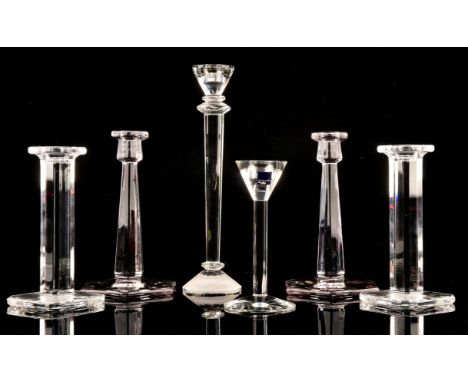 Pair of Waterford glass candlesticks on square bases, 20cm high. together with another pair, similar, with fluted decoration,