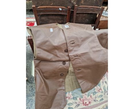 TWO VINTAGE MILITARY LEATHER SMOCKS DATED 1956 AND 1961. 