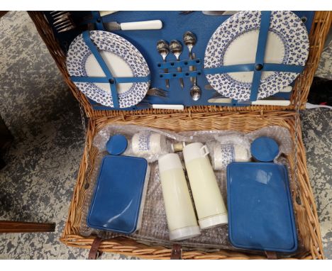 A VINTAGE WICKER PICNIC SET 