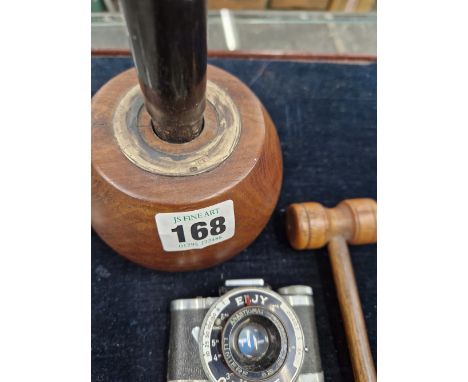 A LUMIERE, ELJY CAMERA, TWO GAVELS AND A MAUL.