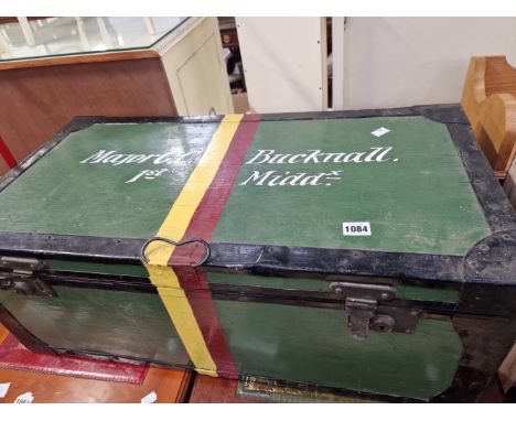 A VINTAGE MILITARY UNIFORM TRUNK