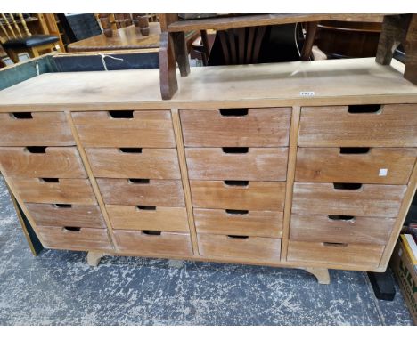A VINTAGE MID CENTURY RETRO MULTI DRAWER CHEST.&nbsp;H 69 W 122 D 36cms
