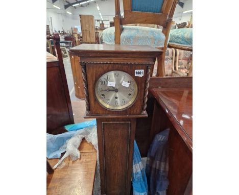 A VINTAGE OAK GRANDMOTHER CLOCK.