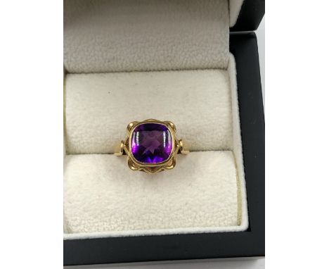 A VINTAGE CUSHION CUT GEMSET RING IN A BASKET TYPE RING MOUNT. FINGER SIZE P. MARKED 18K W&amp;A FOR DENMARK. ASSESSED AS 18c