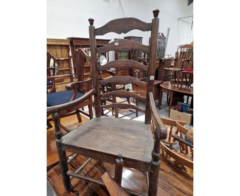 A GEORGIAN LADDER BACK COTTAGE ARMCHAIR