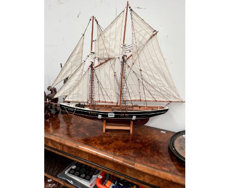 A SCALE MODEL OF THE TWO MASTED YACHT BLUENOSE UNDER FULL SAIL