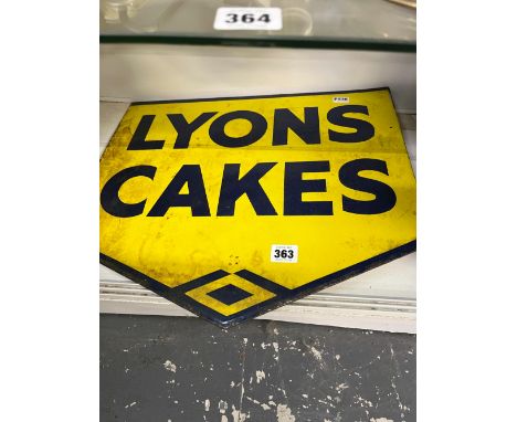 A DOUBLE SIDED VINTAGE LYONS CAKES ENAMEL SIGN. 