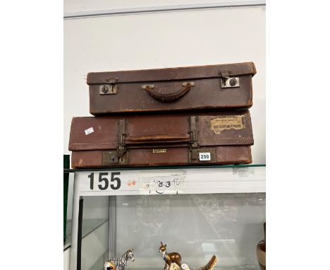 TWO VINTAGE LEATHER SUITCASES. 