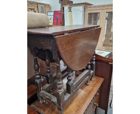 A 18th C. AND LATER GATE LEGGED TABLE 