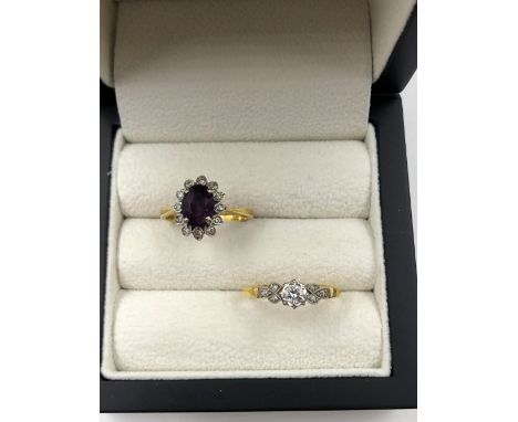 AN 18ct HALLMARKED GOLD AMETHYST AND DIAMOND CLUSTER RING, TOGETHER WITH AN 18ct AND PLATINUM DIAMOND SINGLE STONE RING. GROS