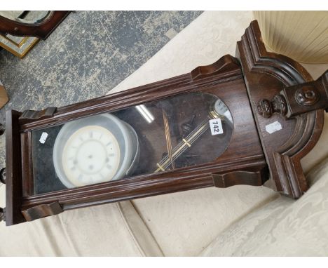 A MAHOGANY CASED WALL CLOCK 