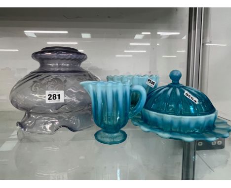 A VINTAGE OPAQUE BLUE GLASS BUTTER DISH, TOGETHER WITH JUG AND BOWL AND A GLASS LIGHT SHADE. 