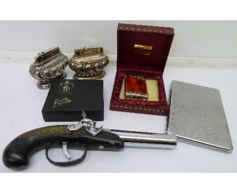 Cigarette lighters and a cigarette case