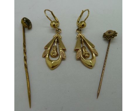 A pair of 9ct gold earrings, a 9ct gold stick pin and a horseshoe stick pin, weight of 9ct 5.7g