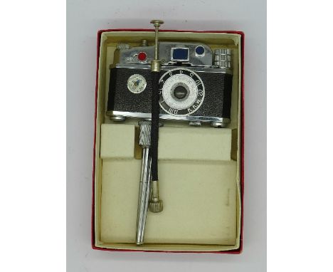 A 1950's novelty camera cigarette lighter