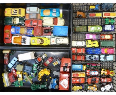 A collection of die-cast model vehicles, playworn