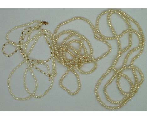 Three freshwater pearl necklaces, one with 9ct gold clasp