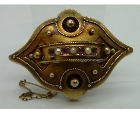 A Victorian, yellow metal, ruby and pearl brooch, weight 12.2g, width 48mm