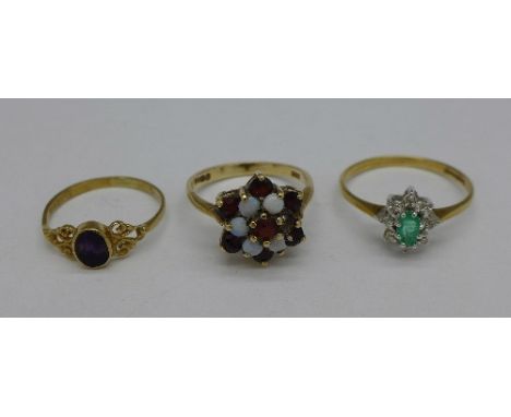 Three 9ct gold rings; opal and garnet, lacking one stone, emerald and white stone and Blue John, weight 5.1g, sizes L, O and 