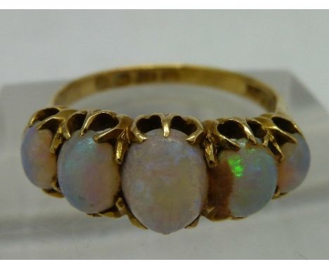 An 18ct gold five stone opal ring, Birmingham 1900, weight 3.6g, size P