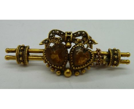 A Victorian 15ct gold, heart shaped citrine and seed pearl brooch, weight 5.3g, lacking pearls
