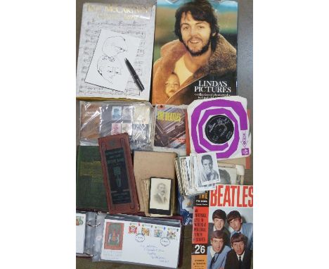 An album of 1980's stamp first day covers, postcards, books, The Beatles Please, Please Me twin track mono tape record, a Bea