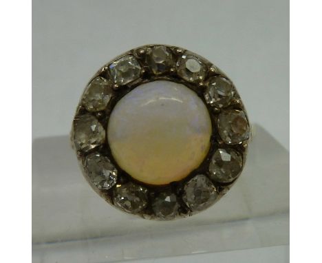 A yellow metal set, diamond and opal ring, weight 5.7g, size S