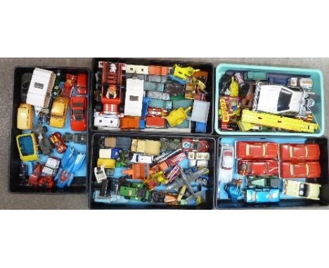 A collection of die cast model vehicles, playworn
