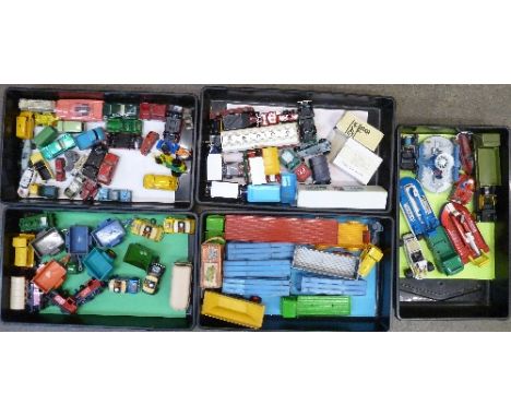A collection of die-cast model vehicles, playworn