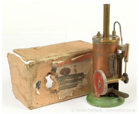 Burnac Vertical Steam Engine (Vulcan model) mounted on a circular base with single cylinder and 2¬" flywheel.  Has been used 