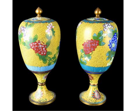Pair of Chinese Cloisonne Enamel Pedestal Covered Vases. Flower decor on yellow ground. Measures 12-3/4" H. Condition: Rubbin