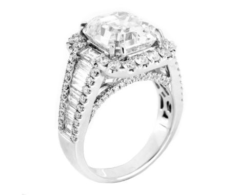 GIA Certified 5.27 Carat Emerald Cut Diamond and 18 Karat White Gold Engagement Ring Accented Throughput with Approx. 3.50 Ca