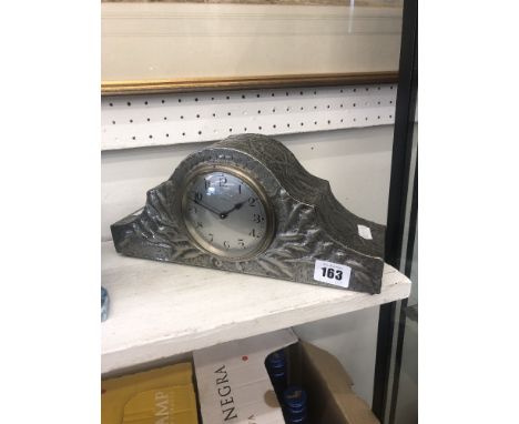 A French Art Nouveau pewter mantle clock