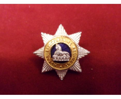 Royal Lincolnshire Regiment Officers Forage Cap Badge (Silver and gilt with blue enamel backing), two lugs. K&amp;K: 1958