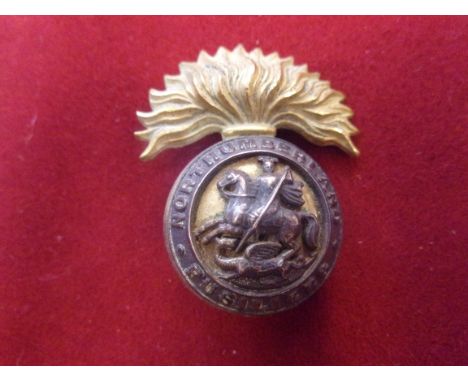 The Lancashire Fusiliers WWI Cap Badge (Brass Economy) with fellow feather plume for the dress cap. K&amp;K: 618