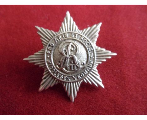 The Duke of Cambridge's Middlesex Yeomanry (Hussars) Cap Badge (White-metal), two lugs. In the centre the cypher of Edward VI