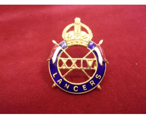 24th Lancers Officers Cap Badge (Gilt and enamel), two lugs. K&amp;K: 1914. An excellent badge and scarce variant. 