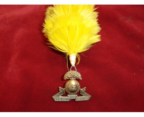 The Lancashire Fusiliers WWI Cap Badge (Bi-metal) with fellow feather plume for the dress cap. K&amp;K: 618