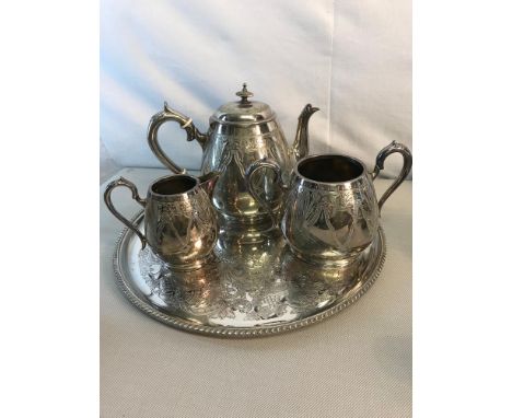Victorian 3 piece ornate tea service with additional Silver plated ornate serving tray 