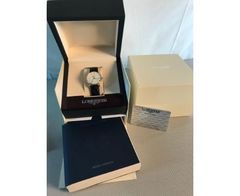 18ct gold Longines mens watch with leather strap, comes with original certificate card of purchase, Manual book & original di