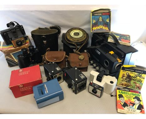 A lot to include various polaroid cameras, Sankyo projector & films, binoculars & barometer 
