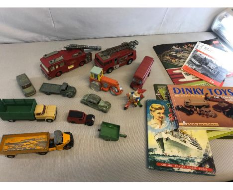 Collection of dinky & Corgi playworn models together with Toy booklets and guides 