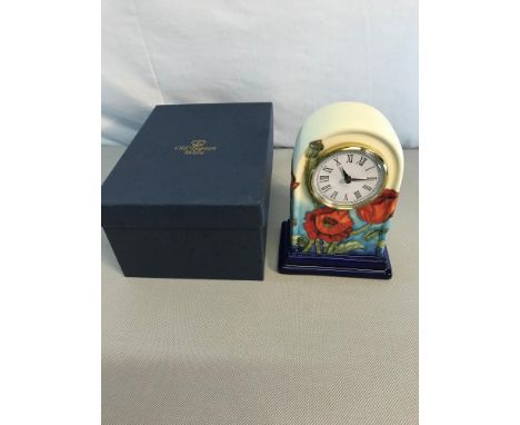 Old Tupton ware flower design clock with box, 17cm in height 