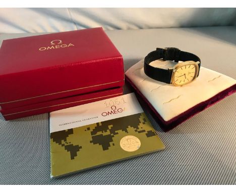 1980's Omega De Ville watch with certificate booklet and box. Watch is running and working order. Box is sitting squint as se