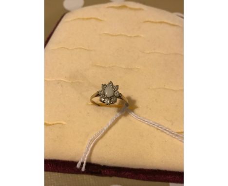 9ct gold ladies ring set with opal and CZ 