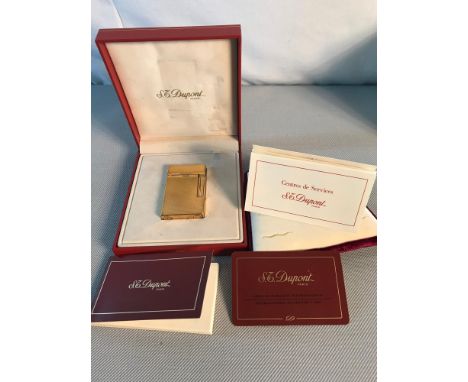 S.T.Dupont Paris gold plated lighter with certificate, Booklets and case. 
