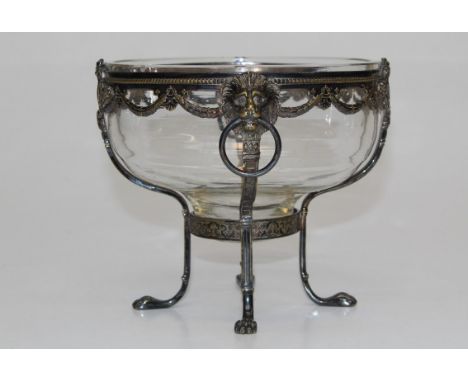 WMF, a late 19th century silver plated table bowl, with lion's mask ring handles and swag decoration, clear glass liner, rais