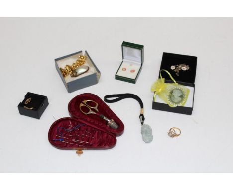 A small quantity of costume jewellery, jade pendant, Edwardian needlework case and other items&nbsp;